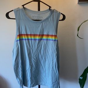 XL light blue tank with rainbow colors across the front from Fifth Sun